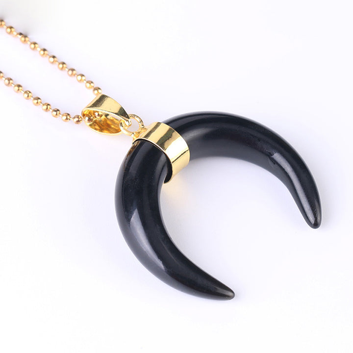 Collar de luna creciente con piedras preciosas de Olivenorma