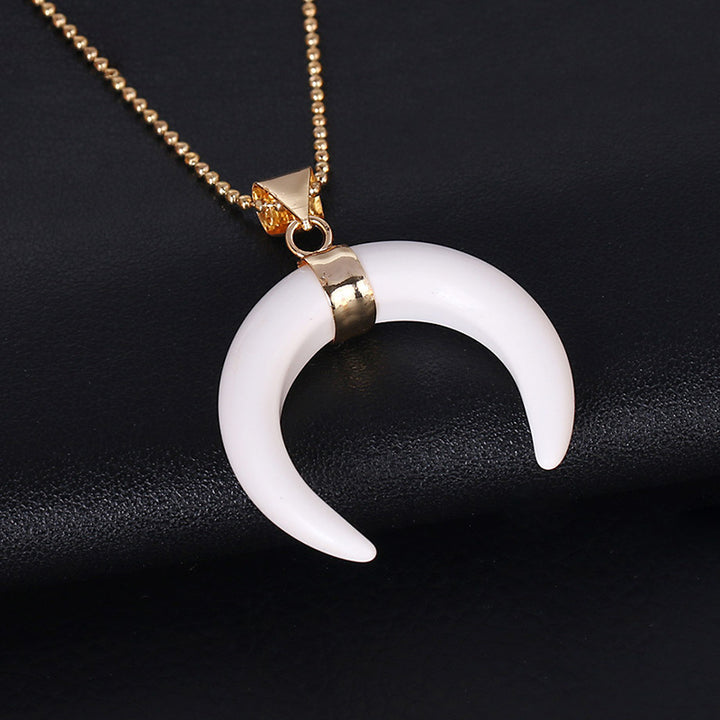 Collar de luna creciente con piedras preciosas de Olivenorma