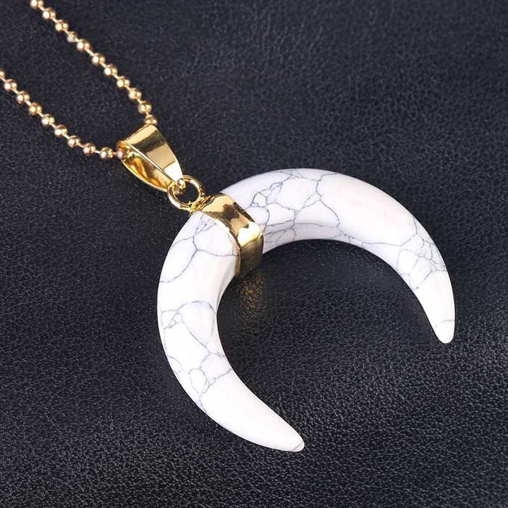 Collar de luna creciente con piedras preciosas de Olivenorma
