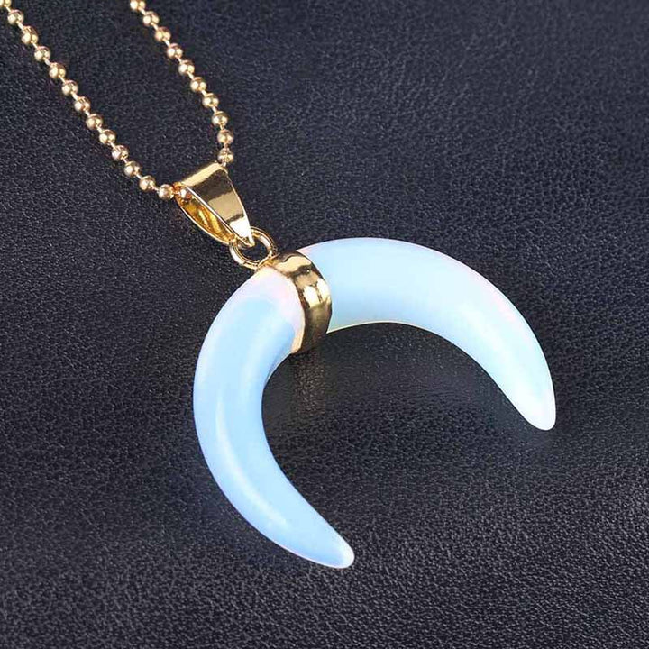 Collar de luna creciente con piedras preciosas de Olivenorma