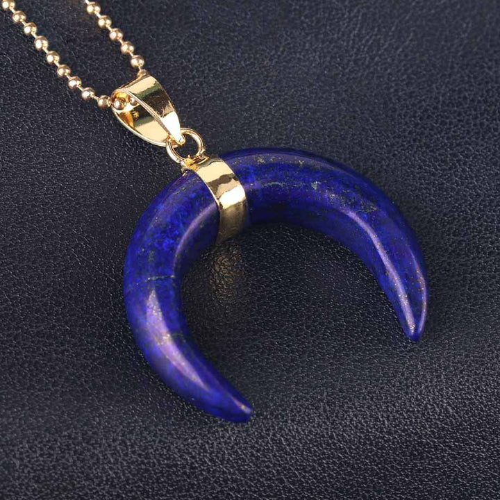 Collar de luna creciente con piedras preciosas de Olivenorma