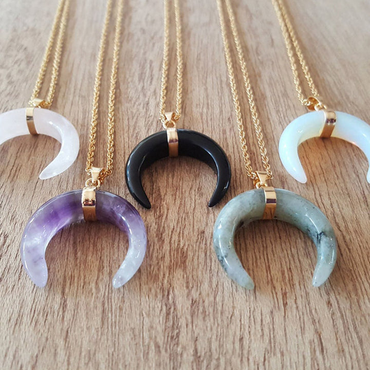 Collar de luna creciente con piedras preciosas de Olivenorma