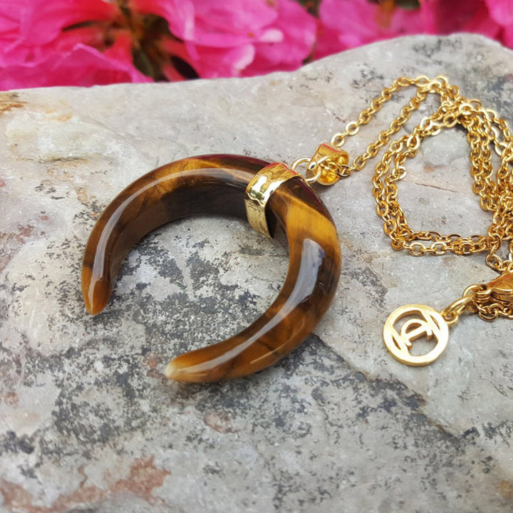 Collar de luna creciente con piedras preciosas de Olivenorma