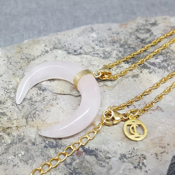 Collar de luna creciente con piedras preciosas de Olivenorma