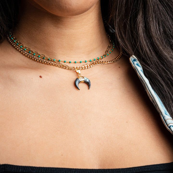 Collar de luna creciente con piedras preciosas de Olivenorma