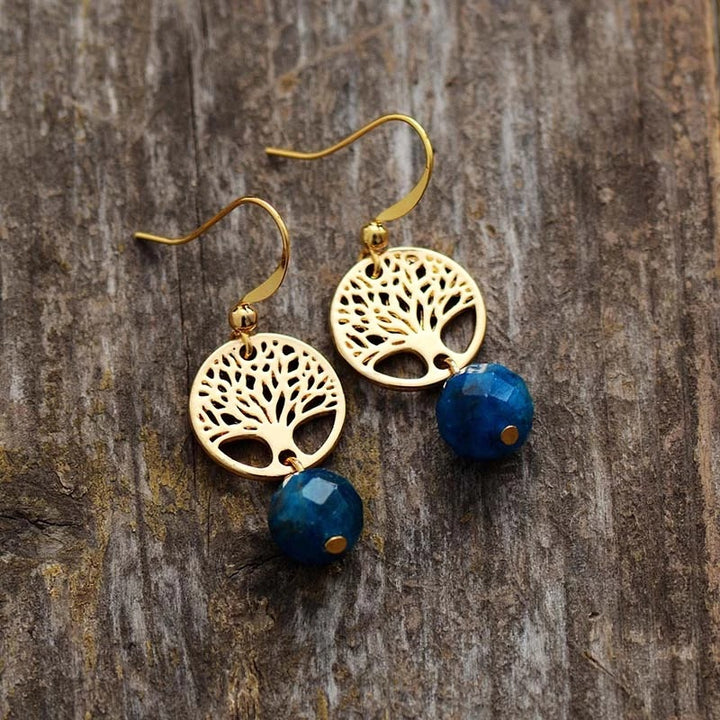 Pendientes de acero y titanio con árbol de la vida y apatita azul de Olivenorma