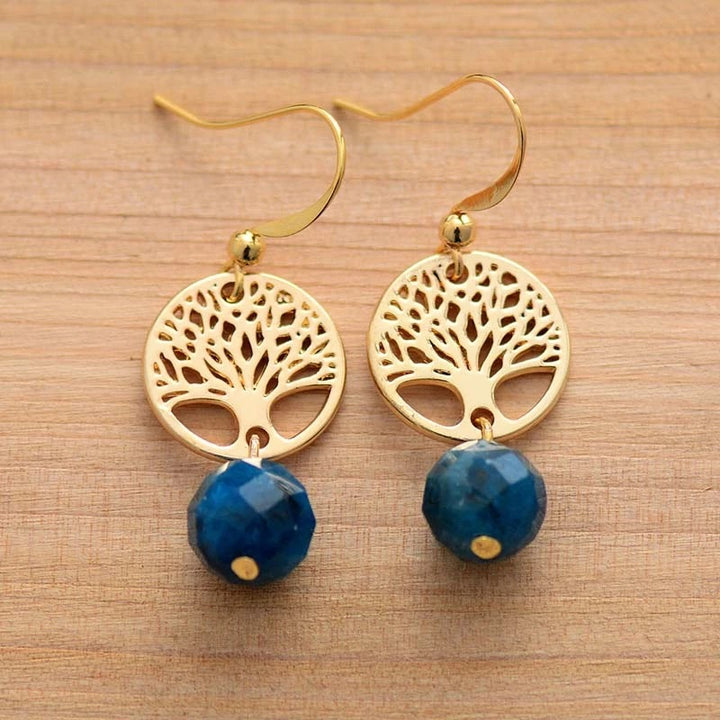 Pendientes de acero y titanio con árbol de la vida y apatita azul de Olivenorma