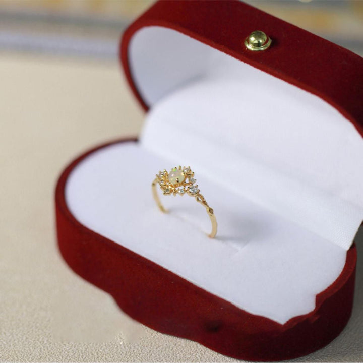 Anillo de lujo ligero con circonita blanca y ópalo incrustado de Olivenorma