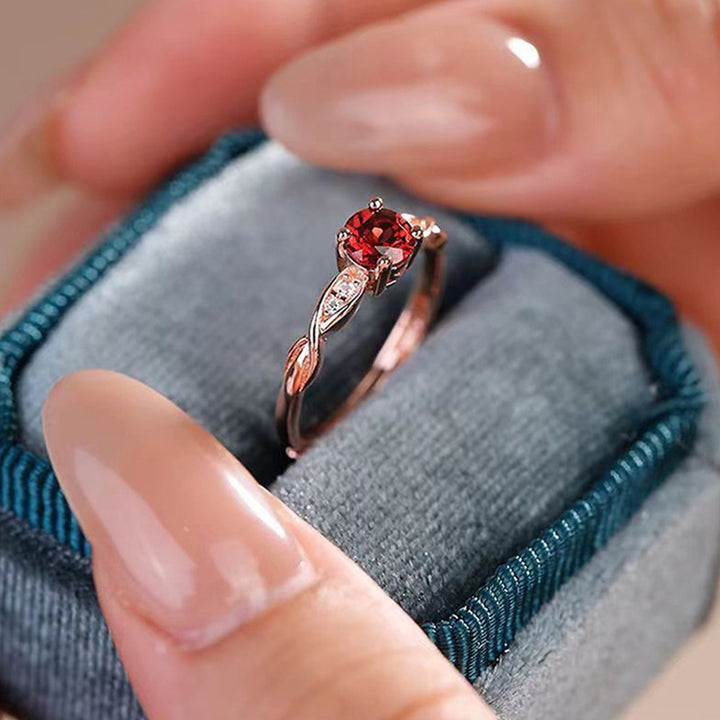 Anillo de granate de cuatro garras de Olivenorma Tianti Vine 