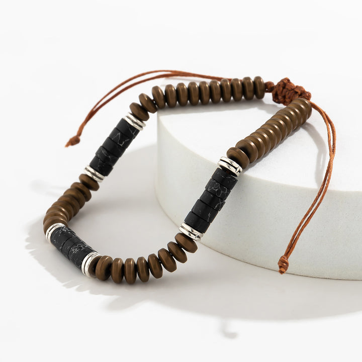 Pulsera trenzada con cordón y cuentas de turquesa y hematita para hombre de Olivenorma