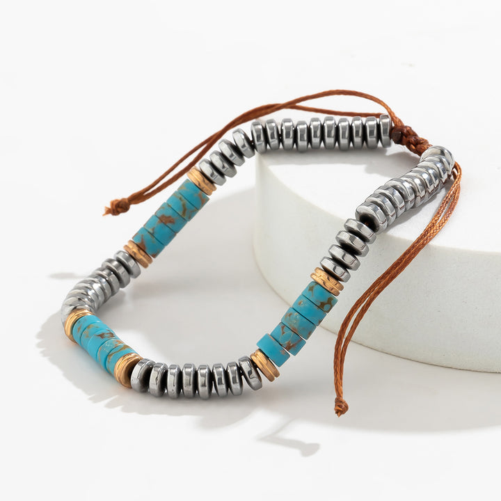Pulsera trenzada con cordón y cuentas de turquesa y hematita para hombre de Olivenorma
