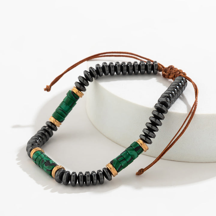 Pulsera trenzada con cordón y cuentas de turquesa y hematita para hombre de Olivenorma