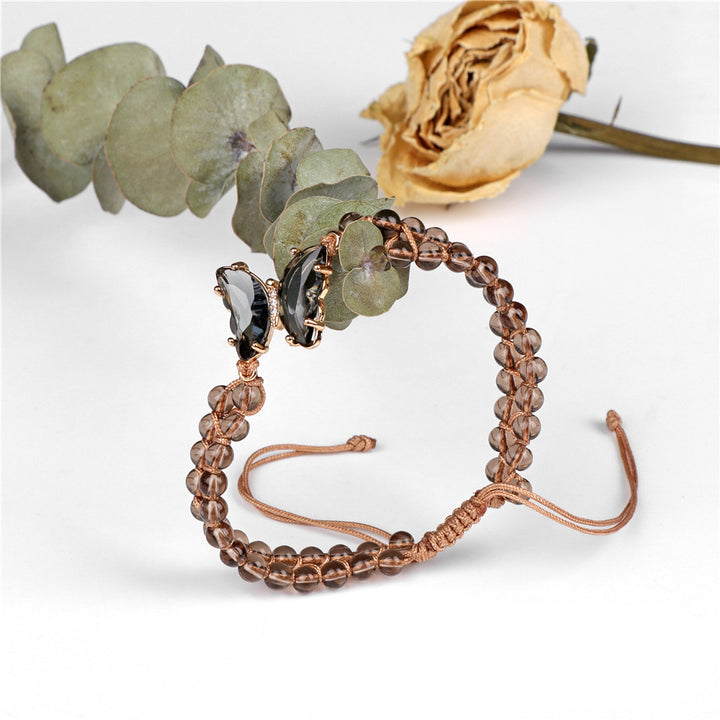 Pulsera de cuerda trenzada ajustable con forma de mariposa y cristales curativos de Olivenorma