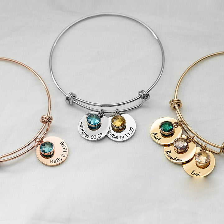 Pulsera retráctil con piedra natal grabada y disco personalizado de Olivenorma 