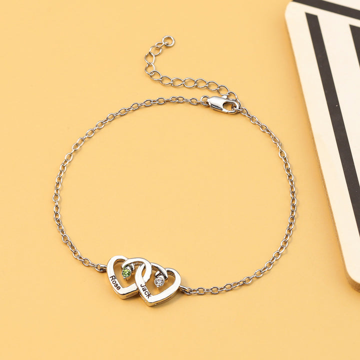 Pulsera Olivenorma con piedra natal grabada en forma de corazón y doble diamante