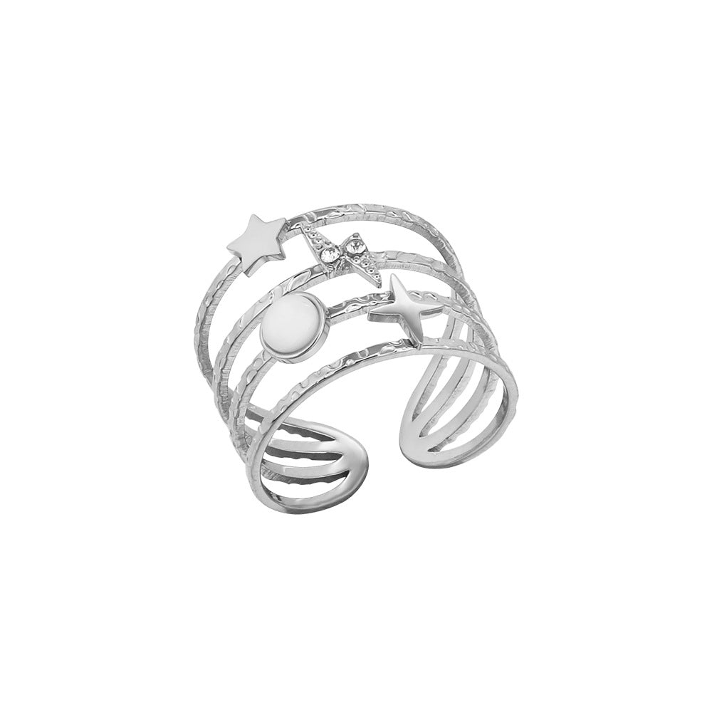 Anillo ajustable abierto de acero y titanio decorado con estrellas de Olivenorma