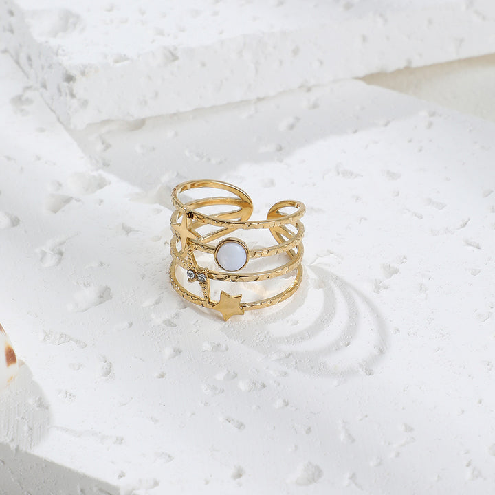 Anillo ajustable abierto de acero y titanio decorado con estrellas de Olivenorma