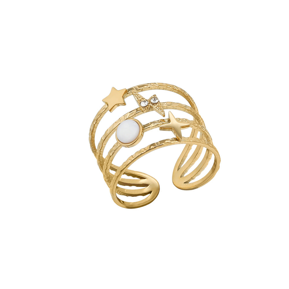 Anillo ajustable abierto de acero y titanio decorado con estrellas de Olivenorma