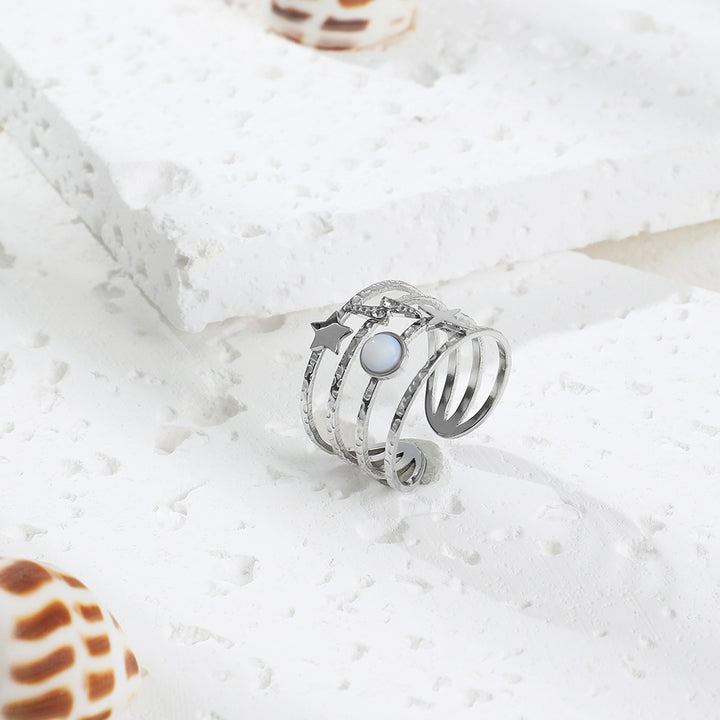 Anillo ajustable abierto de acero y titanio decorado con estrellas de Olivenorma