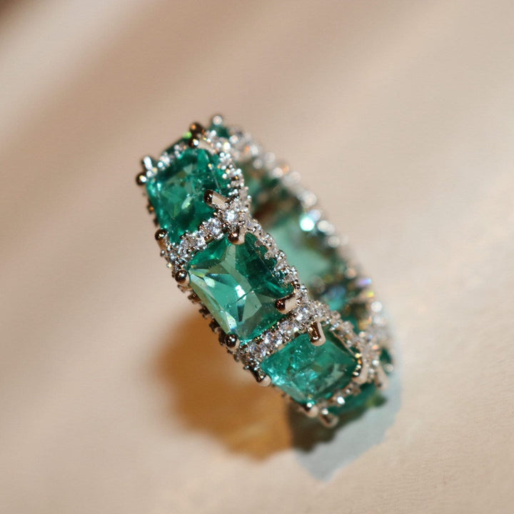 Anillo de eternidad completo con turmalina Paraiba azul océano de Olivenorma