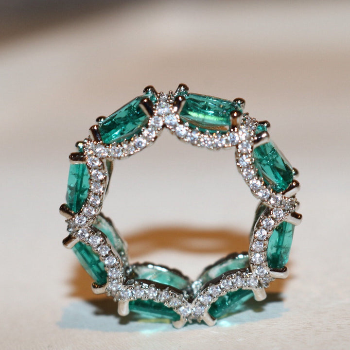 Anillo de eternidad completo con turmalina Paraiba azul océano de Olivenorma
