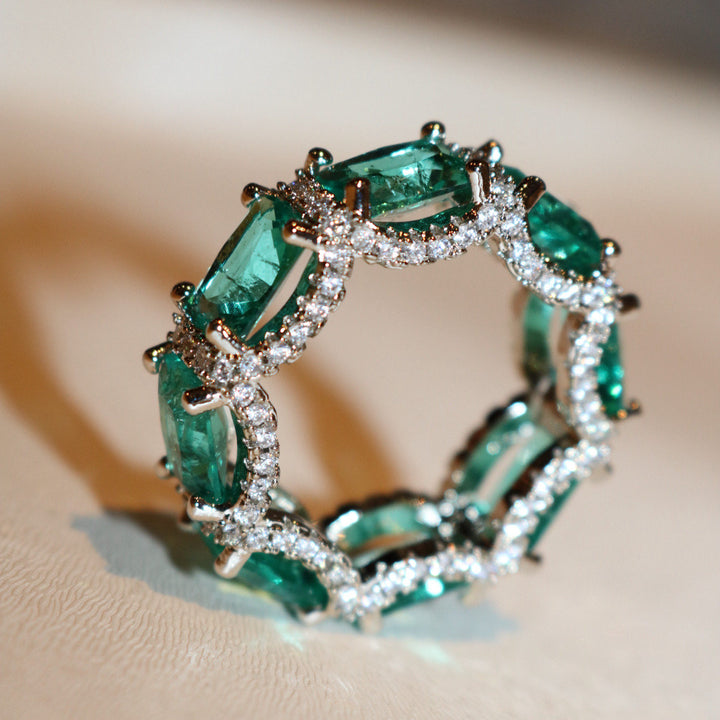 Anillo de eternidad completo con turmalina Paraiba azul océano de Olivenorma