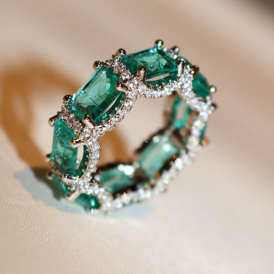 Anillo de eternidad completo con turmalina Paraiba azul océano de Olivenorma