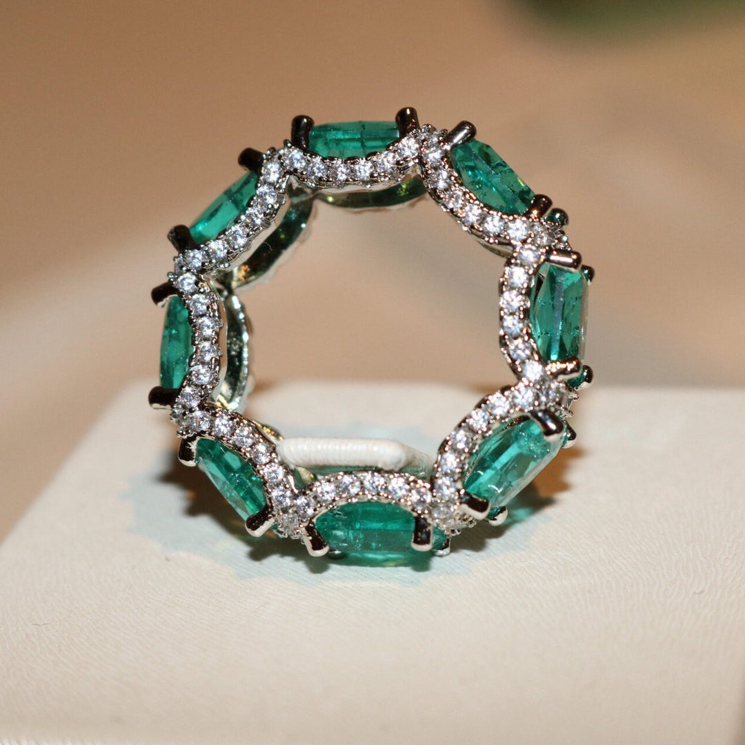 Anillo de eternidad completo con turmalina Paraiba azul océano de Olivenorma