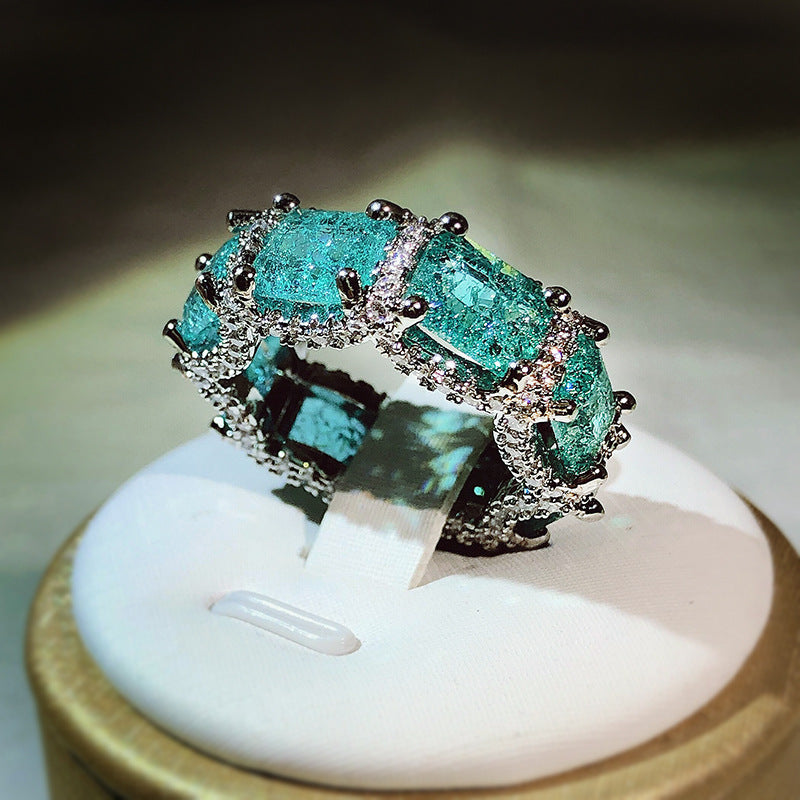 Anillo de eternidad completo con turmalina Paraiba azul océano de Olivenorma