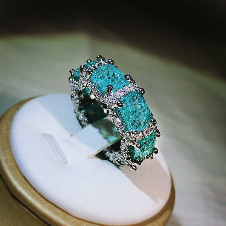 Anillo de eternidad completo con turmalina Paraiba azul océano de Olivenorma