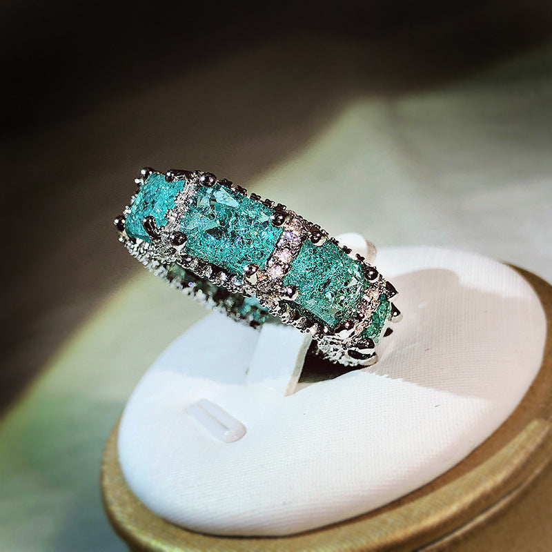 Anillo de eternidad completo con turmalina Paraiba azul océano de Olivenorma