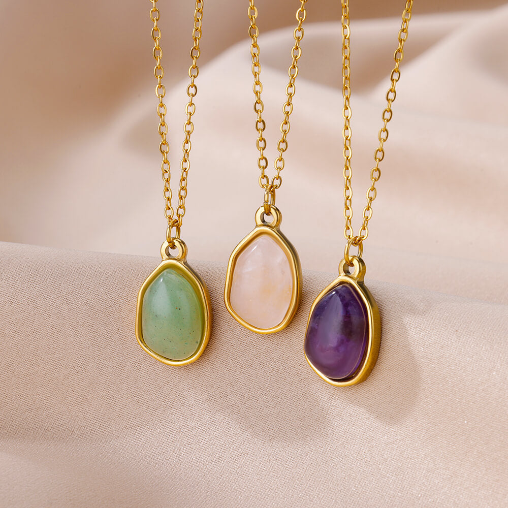 Collar de acero y titanio con colgante de piedra irregular Olivenorma en oro de 18 quilates