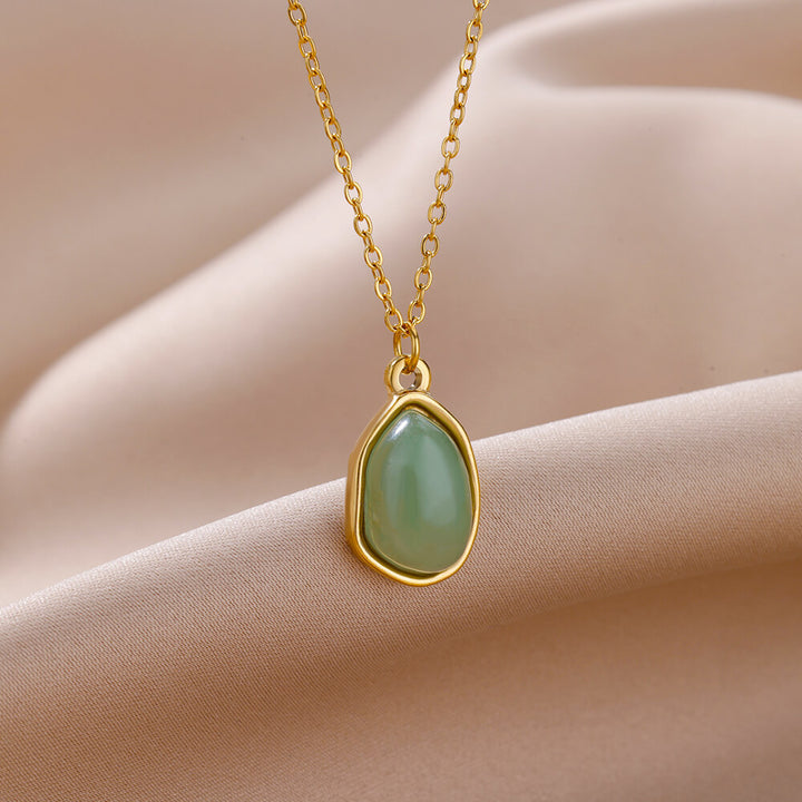 Collar de acero y titanio con colgante de piedra irregular Olivenorma en oro de 18 quilates