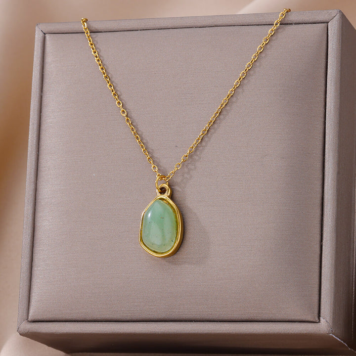Collar de acero y titanio con colgante de piedra irregular Olivenorma en oro de 18 quilates