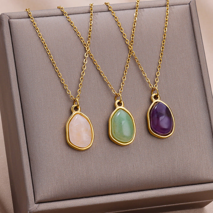 Collar de acero y titanio con colgante de piedra irregular Olivenorma en oro de 18 quilates