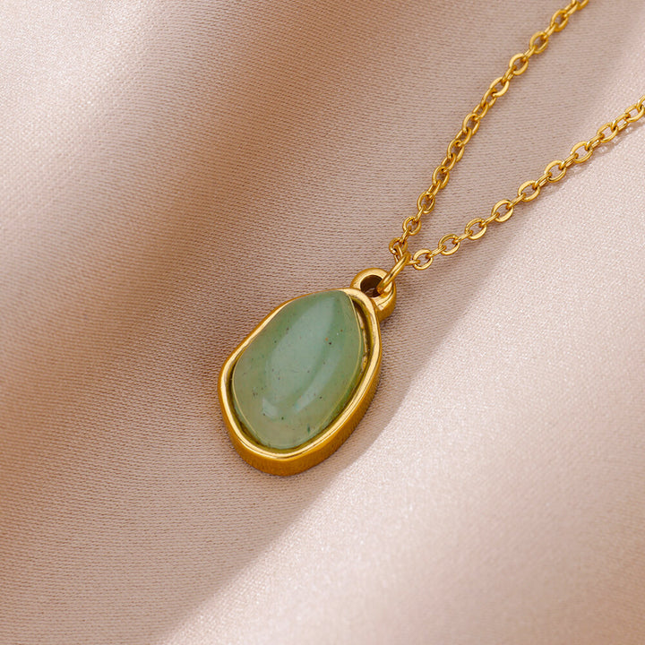Collar de acero y titanio con colgante de piedra irregular Olivenorma en oro de 18 quilates
