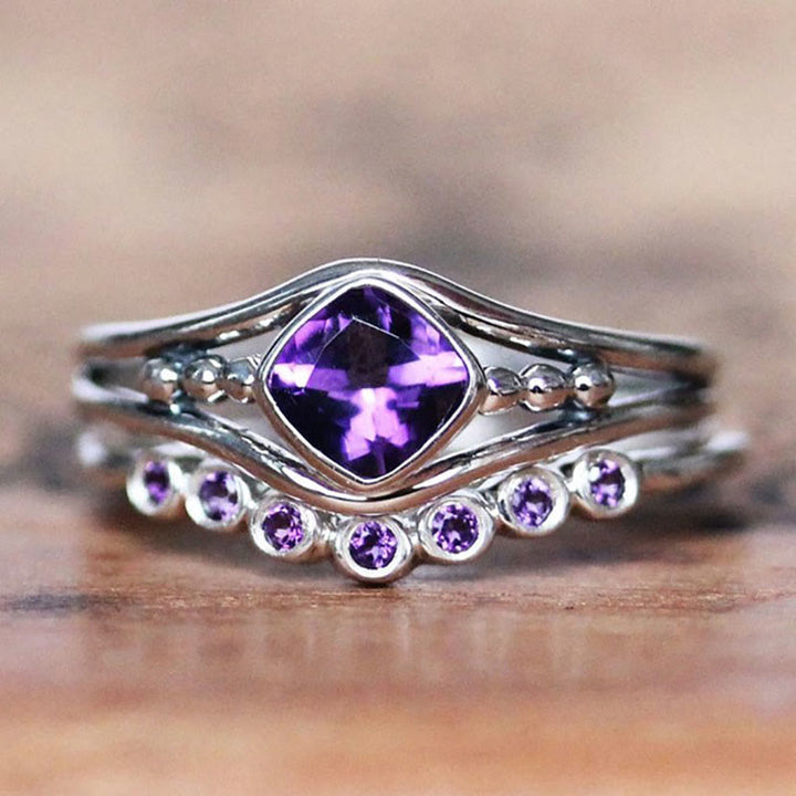Juego de anillos creativos de dos piezas "Quiet Flame" de Olivenorma con amatista 