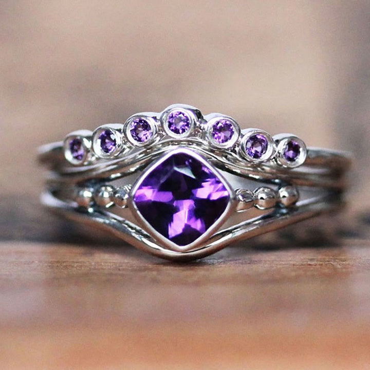Juego de anillos creativos de dos piezas "Quiet Flame" de Olivenorma con amatista 