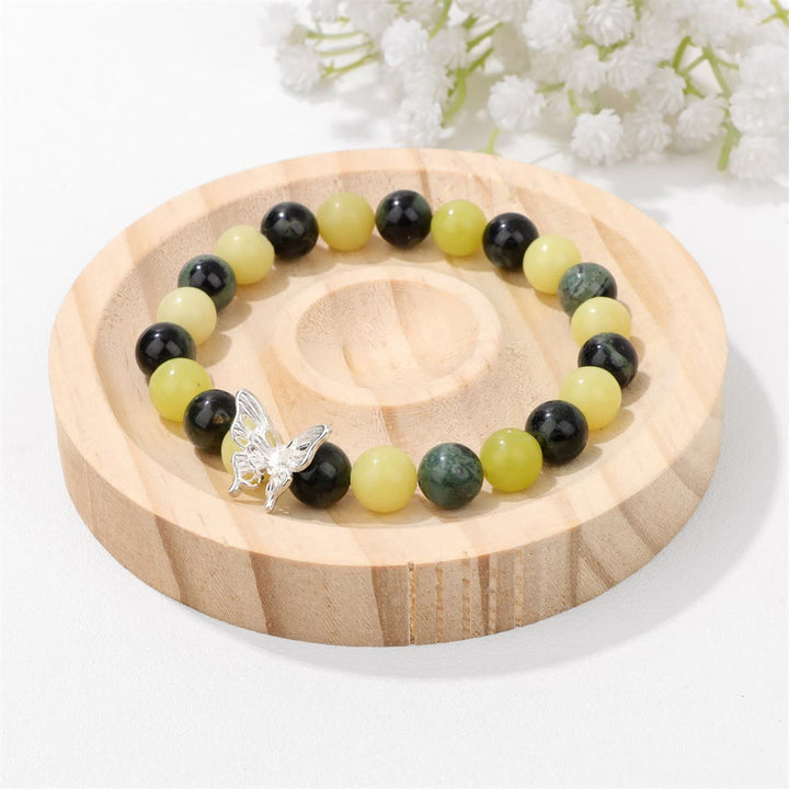 Pulsera con decoración de mariposas y cuentas de piedra natural de Olivenorma
