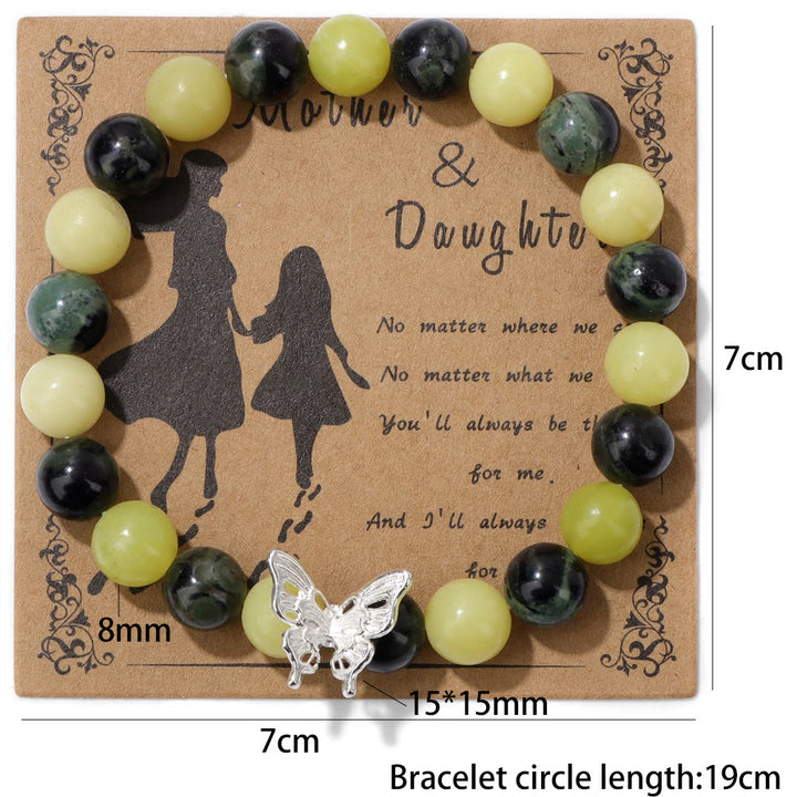 Pulsera con decoración de mariposas y cuentas de piedra natural de Olivenorma