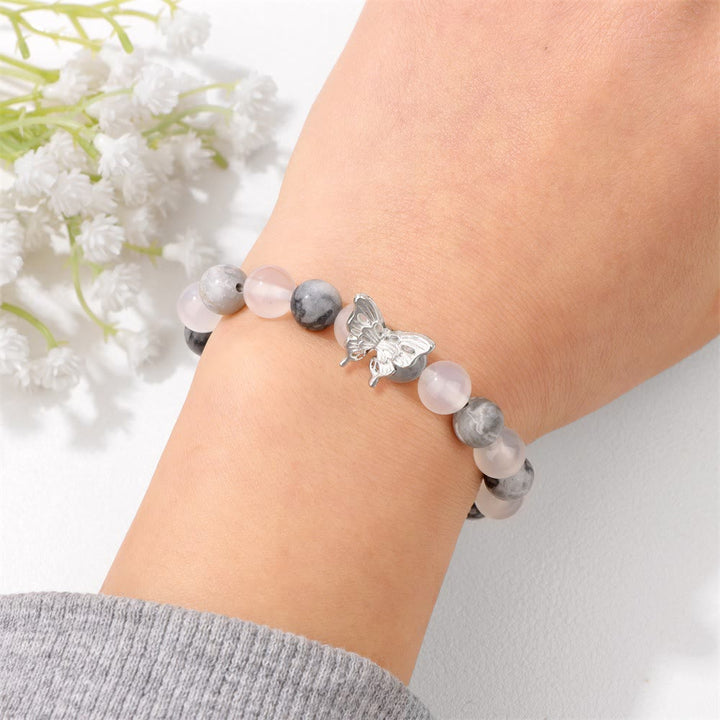 Pulsera con decoración de mariposas y cuentas de piedra natural de Olivenorma