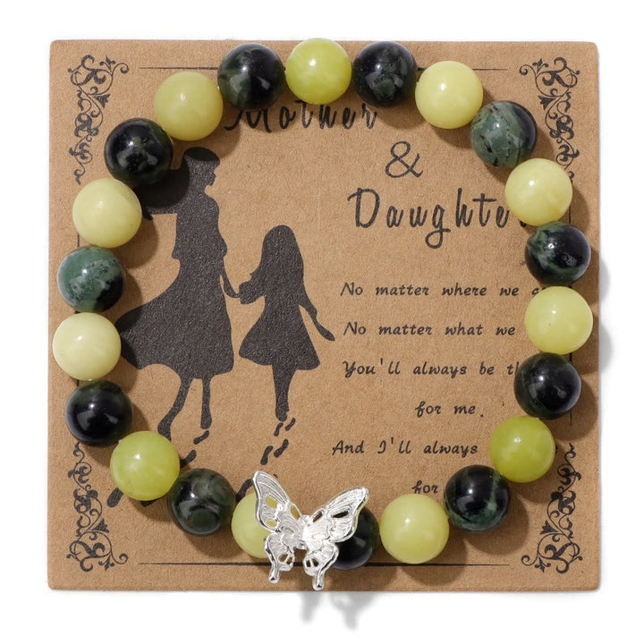 Pulsera con decoración de mariposas y cuentas de piedra natural de Olivenorma