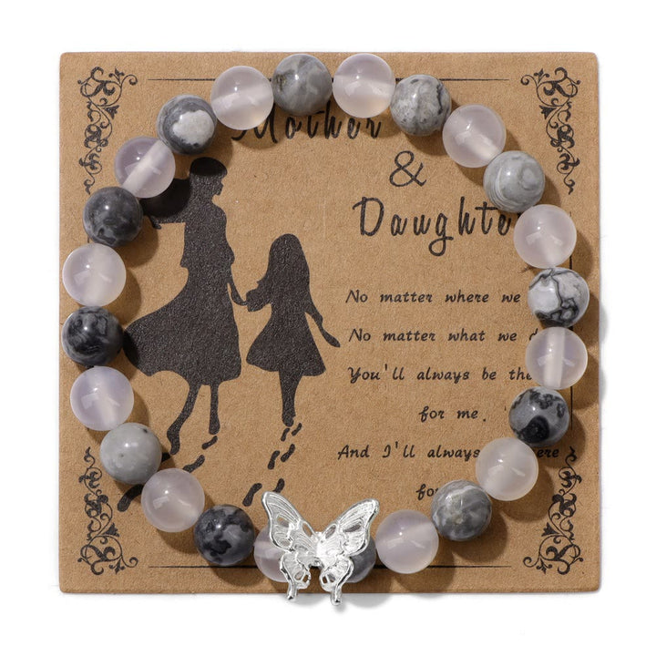 Pulsera con decoración de mariposas y cuentas de piedra natural de Olivenorma