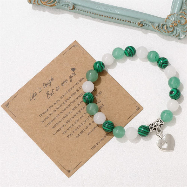 Pulsera con colgante de amor y cuentas de cristal natural de Olivenorma