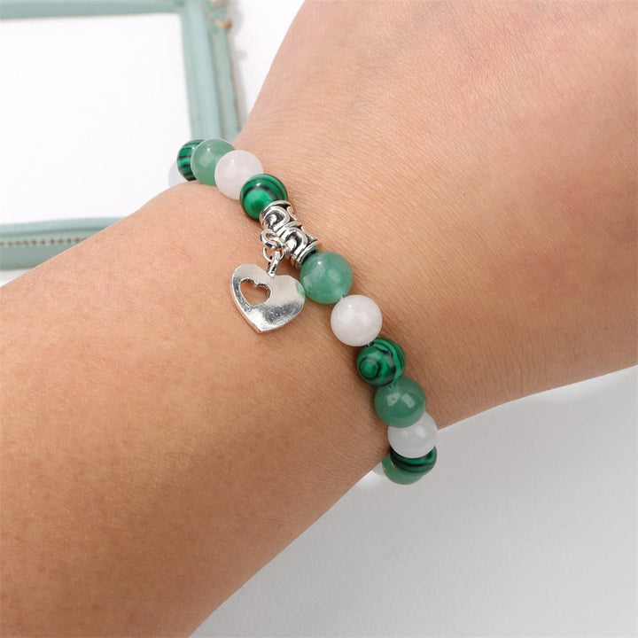Pulsera con colgante de amor y cuentas de cristal natural de Olivenorma