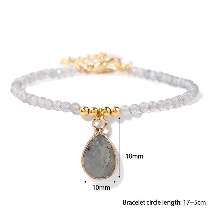 Pulsera con colgante de gota de agua y cuentas de piedra natural de Olivenorma