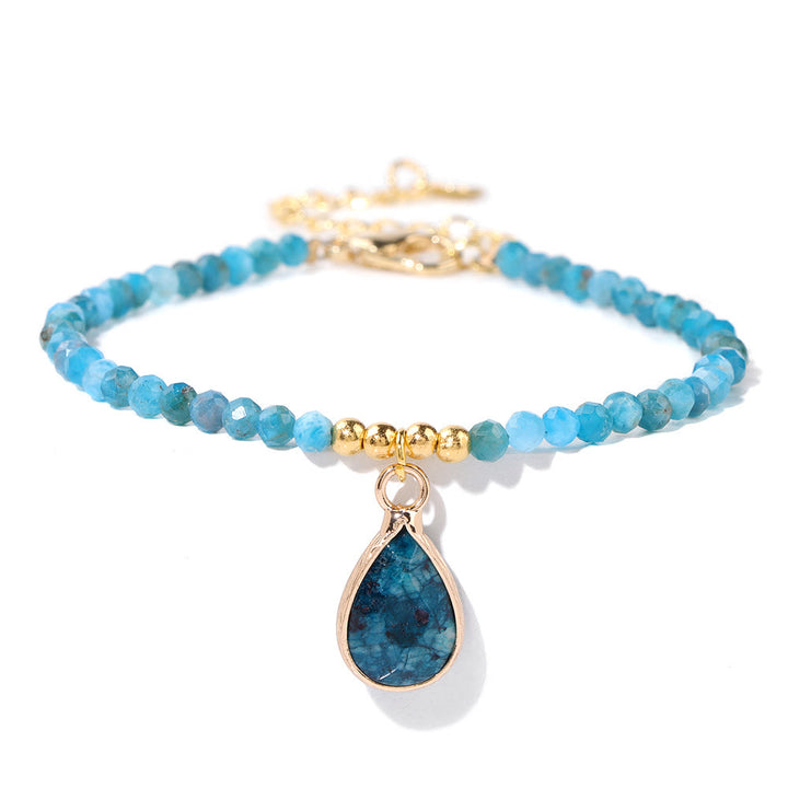Pulsera con colgante de gota de agua y cuentas de piedra natural de Olivenorma