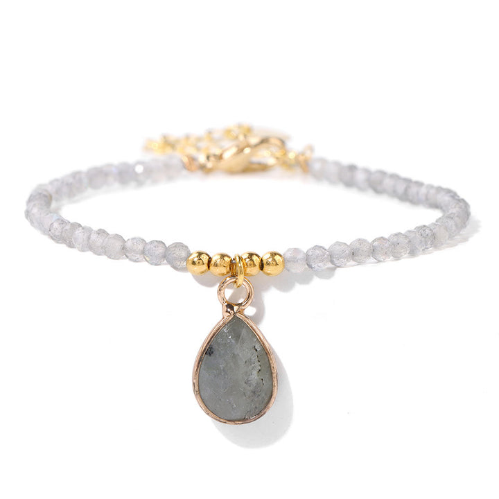 Pulsera con colgante de gota de agua y cuentas de piedra natural de Olivenorma