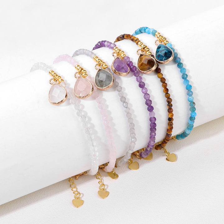 Pulsera con colgante de gota de agua y cuentas de piedra natural de Olivenorma