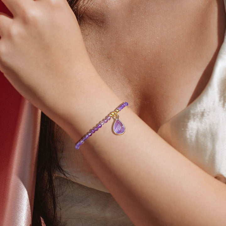Pulsera con colgante de gota de agua y cuentas de piedra natural de Olivenorma